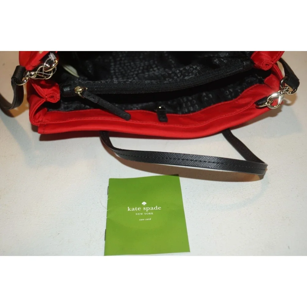 KATE SPADE RED NYLON WITH BLACK LEATHER HANDLES ADJ STRAP PURSE BAG U60